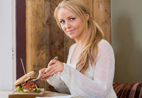 woman eating alone